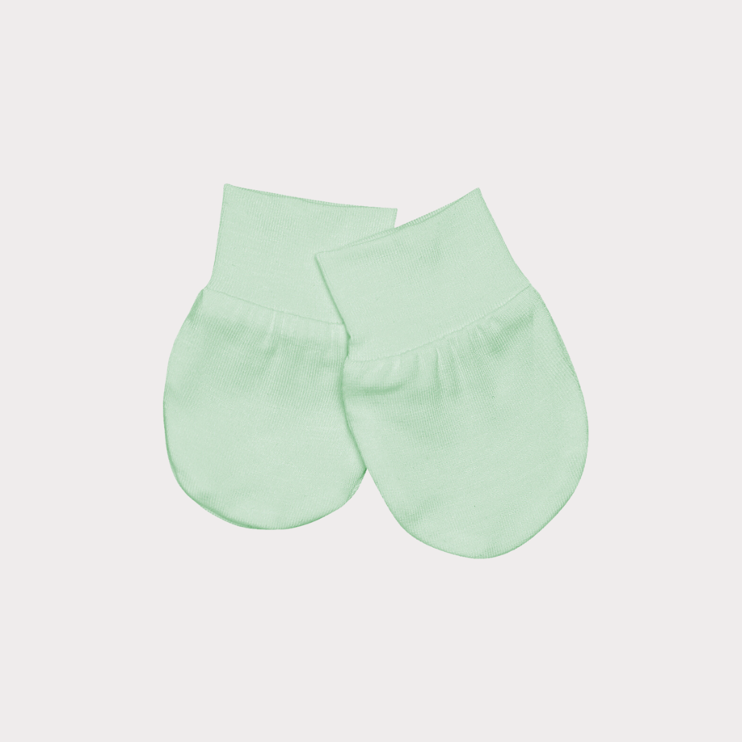a pair of mint green mittens
